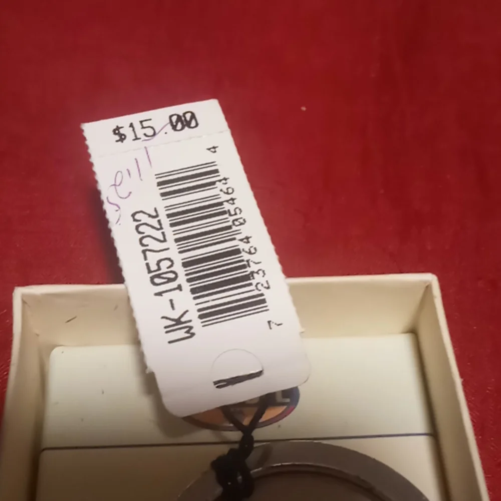Fossil genuine leather snap key chain.